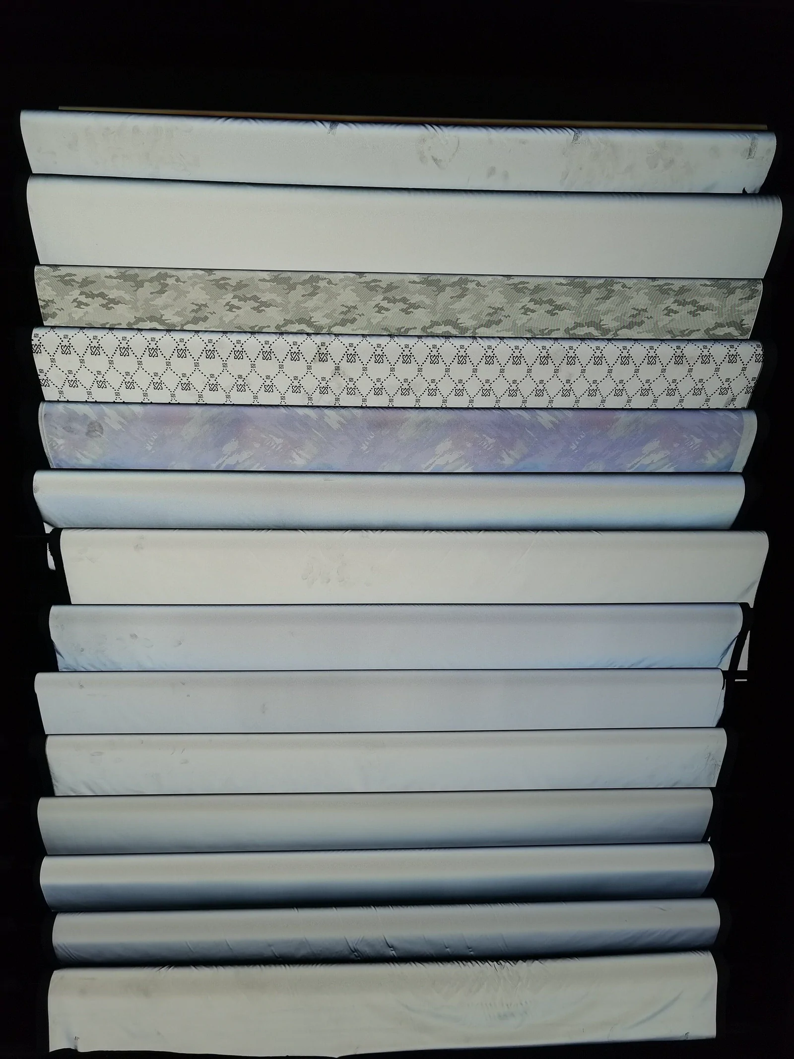 Material rolls arranged for physical sourcing review